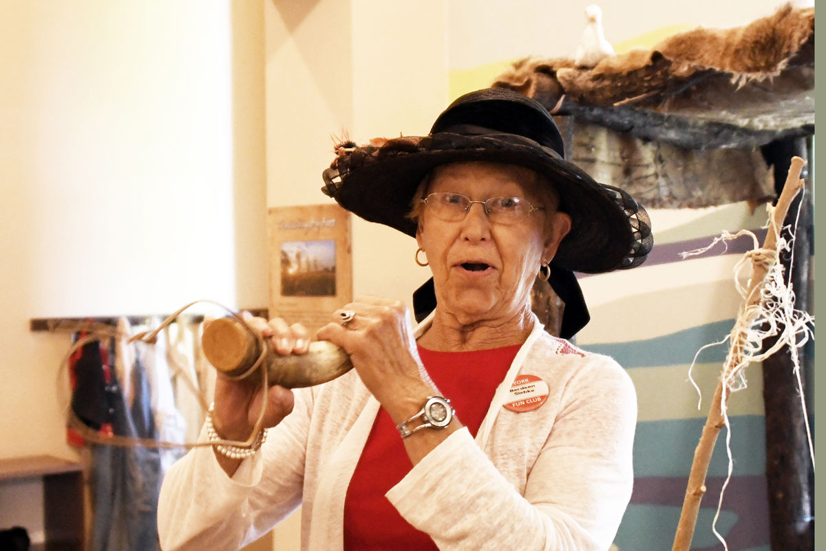 088 Berdeen Siebke plays with a powder horn which a fur trader might have had.JPG